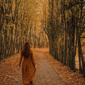 Long linen dress with a button-front bodice and a gathered skirt