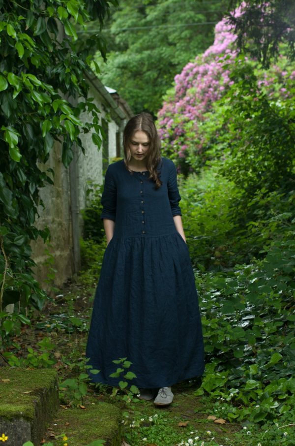 Loose linen dress with a boat neckline and buttoned front