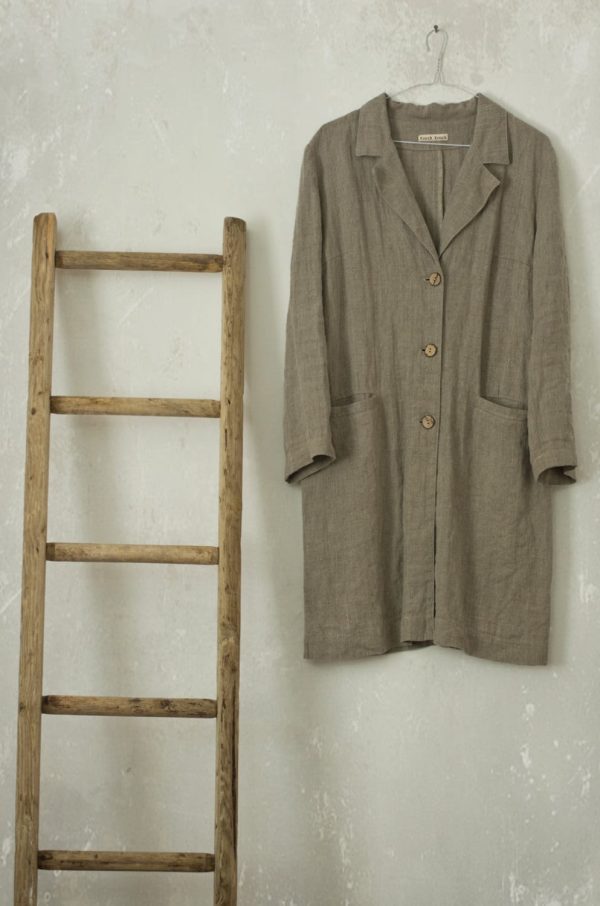 Linen coat work with matching elbow patches and notched lapel