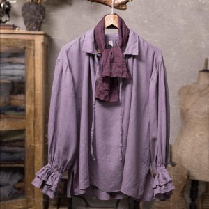 Dark plum linen neckerchief displayed from the front on a hanger, looped around a lavender shirt collar with a wide folded front panel, two layered hanging ends, wrinkled texture, and unfinished-looking edges.